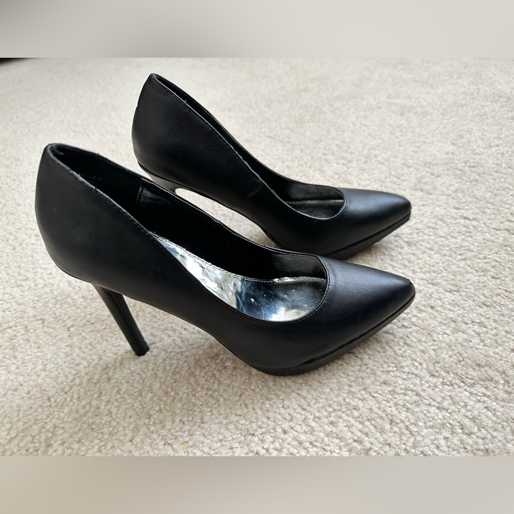 Black high heel.